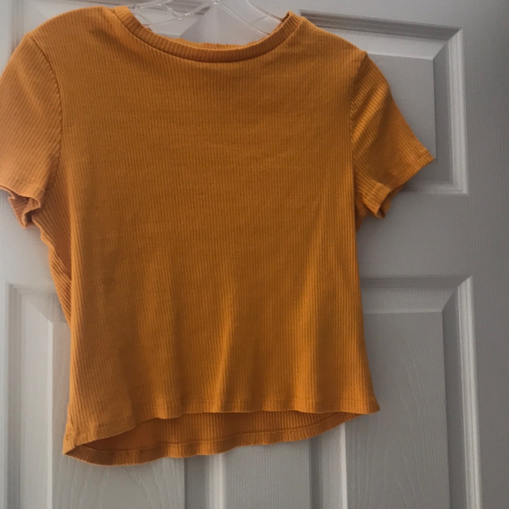 Divided yellow ribbed crop top